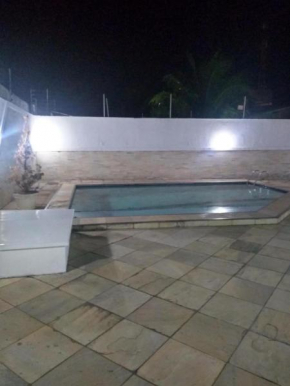 Casa agradável com área de lazer completa